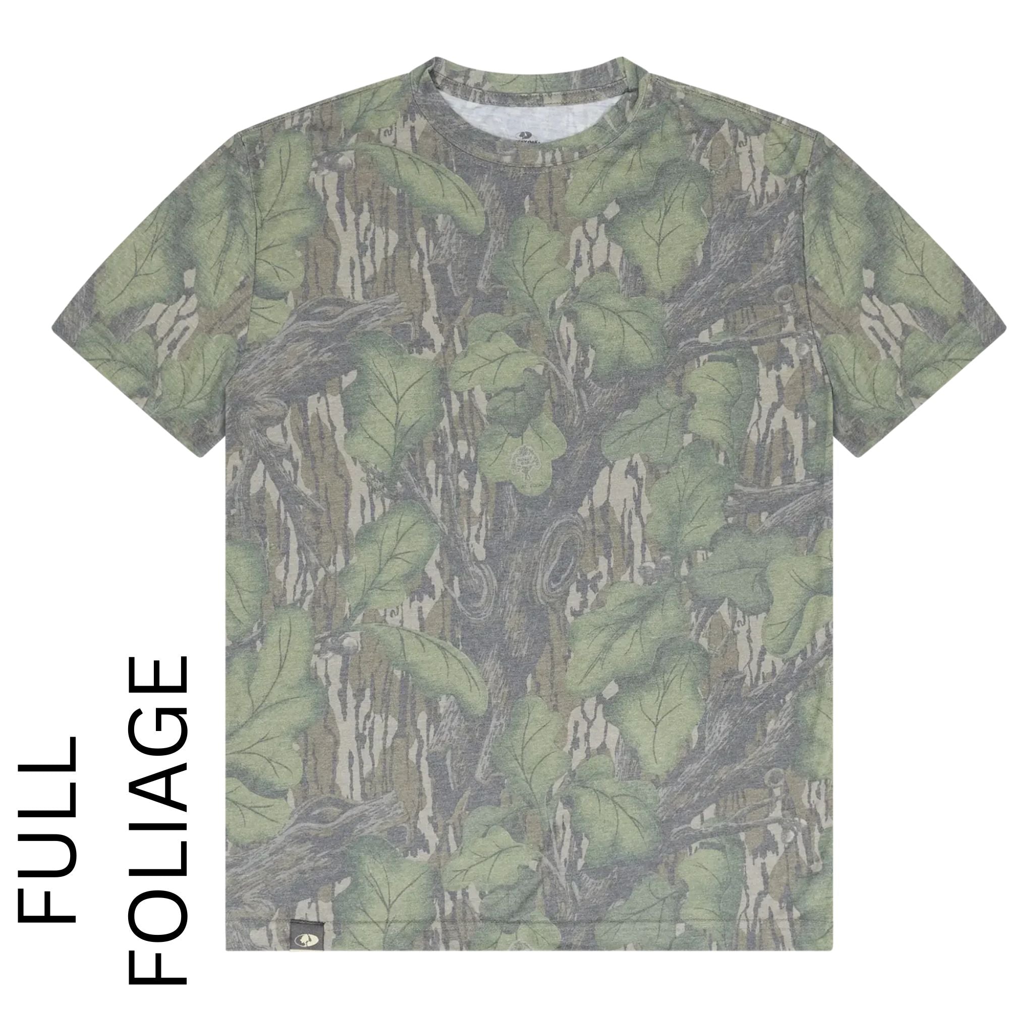 A short-sleeve crewneck t-shirt featuring a realistic forest foliage camouflage pattern with green leaves and brown tree bark. The image is presented on a plain white background with a vertical text overlay on the left side reading 'FULL FOLIAGE'.