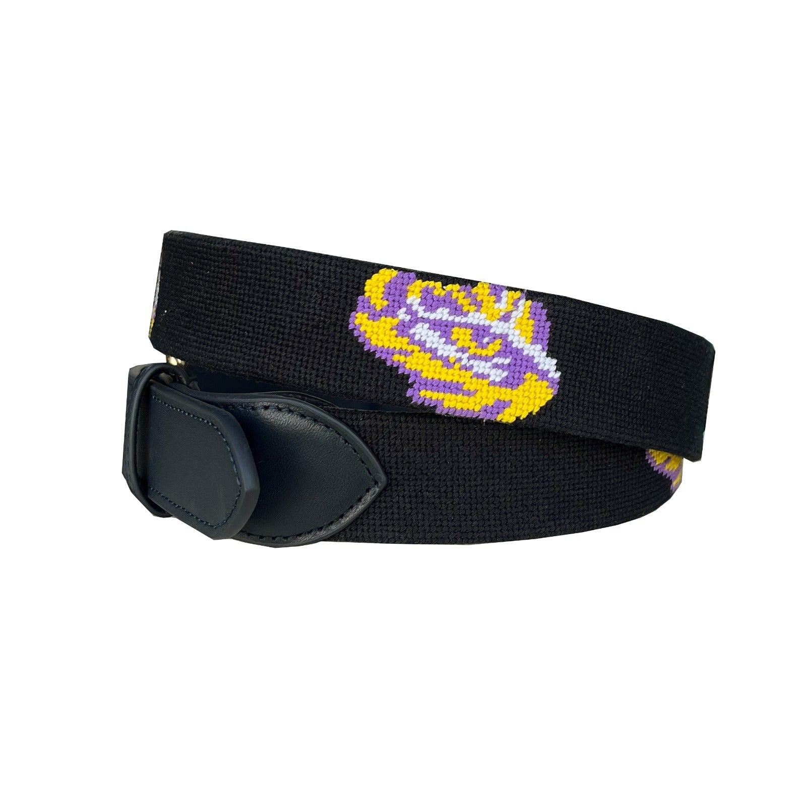 A perfect graduation gift for young men—this LSU tiger needlepoint belt features hand-stitched purple and gold, full-grain leather, and a timeless look he’ll wear from college to career.