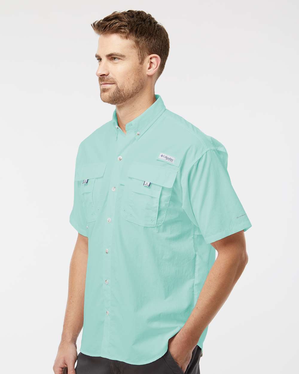 Man wearing a light blue shirt on a white background